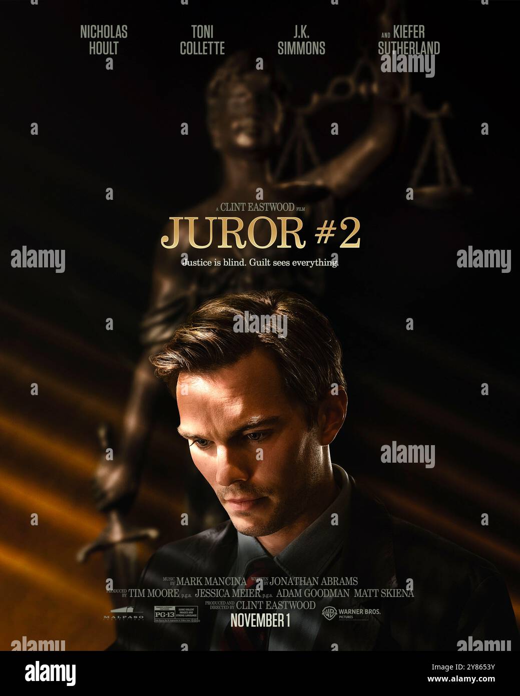 Entertainment lawyer reviewing film-title searches, trademark records, and movie distribution documents