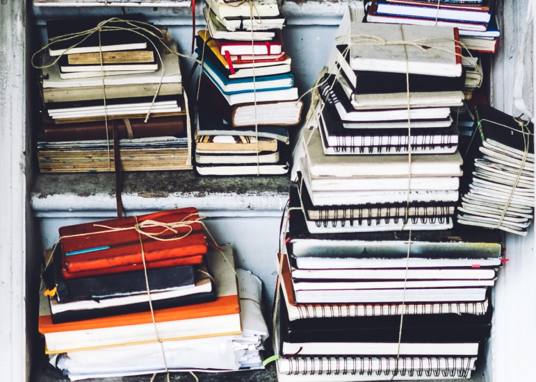 Calendar and research folder used to track official follow-up dates for an international news story